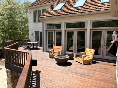 Freshly stained wood deck with railings
